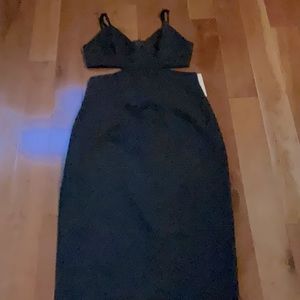 Black evening dress, spaghetti strap slip at the side, elegant eveningwear